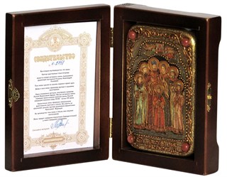 {{photo.Alt || photo.Description || 'Настольная икона Святые царственные страстотерпцы на дубе 10х15 см.'}}